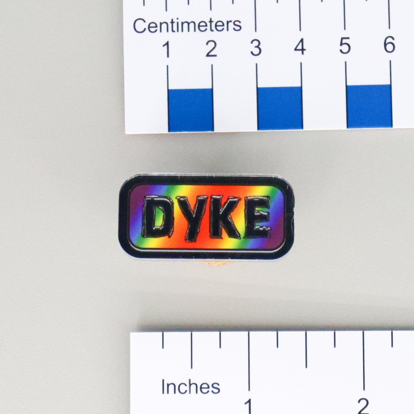 "DYKE" Mirrored Pride Pin