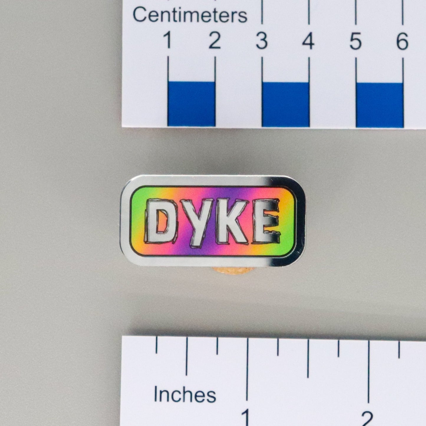 "DYKE" Mirrored Pride Pin