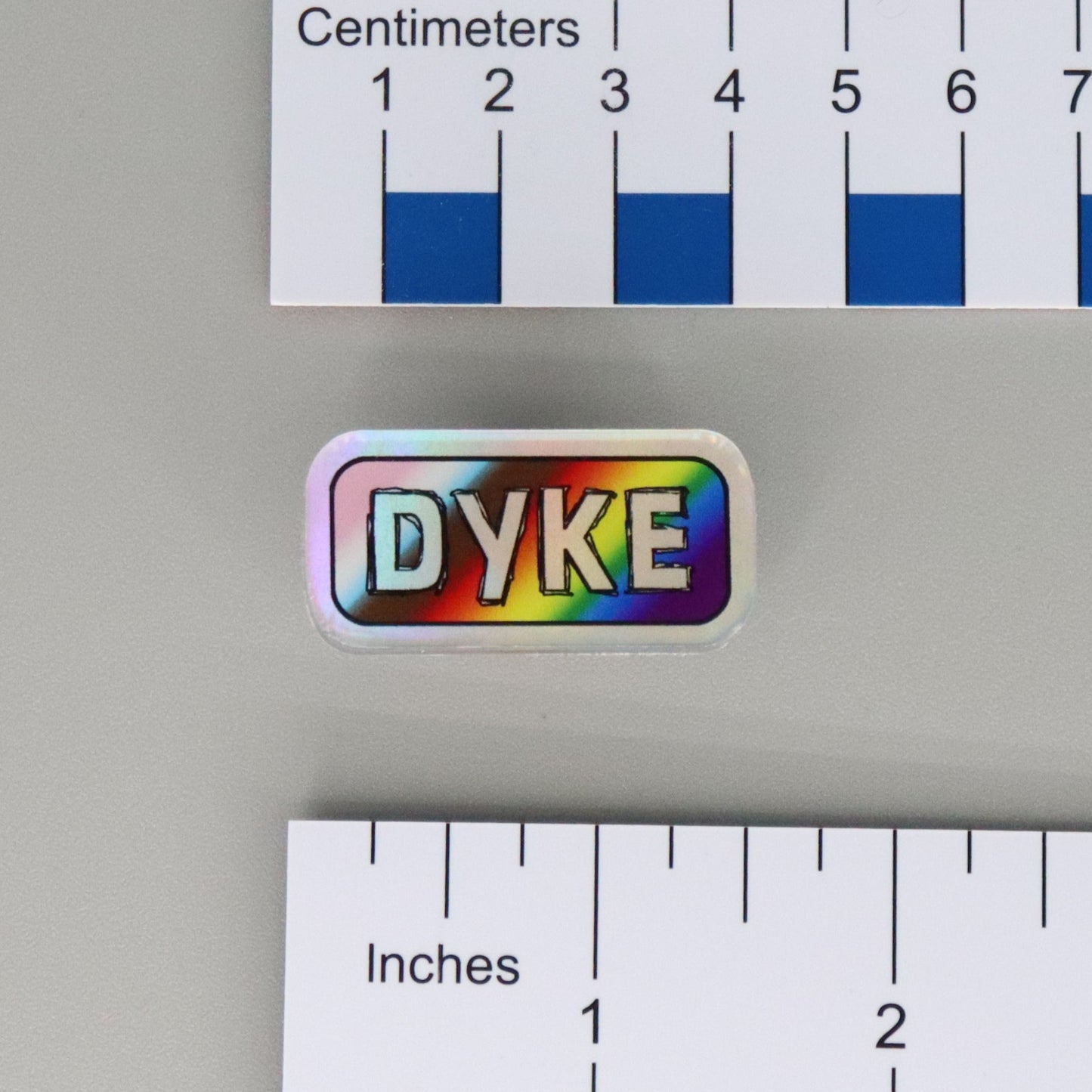 "DYKE" Mirrored Pride Pin