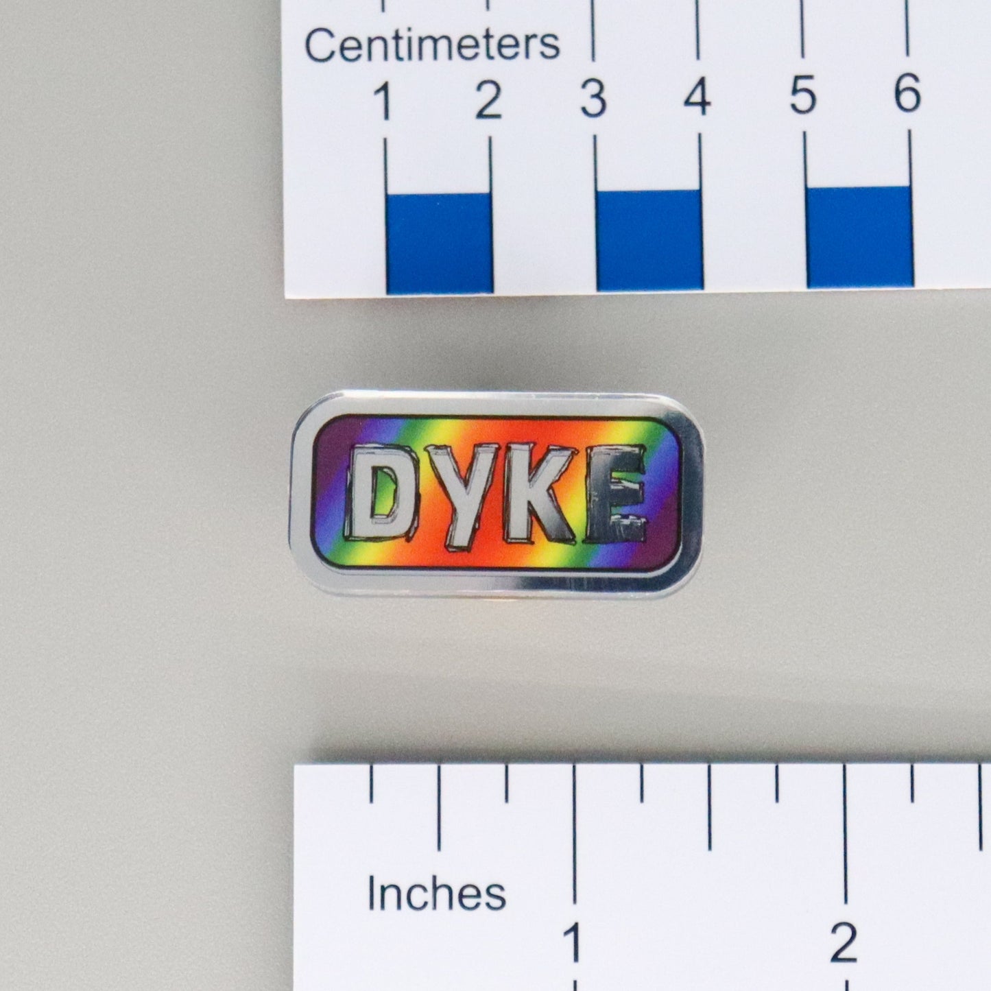 "DYKE" Mirrored Pride Pin