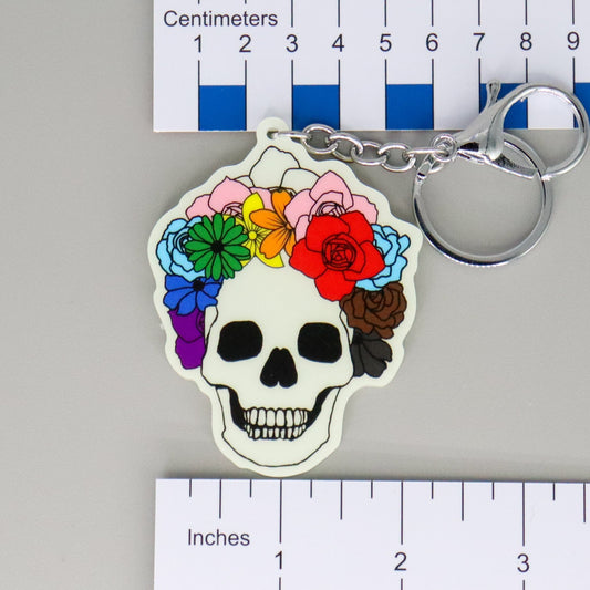 Proud to the Bone Glow in the Dark Skull Progress Pride Keychain